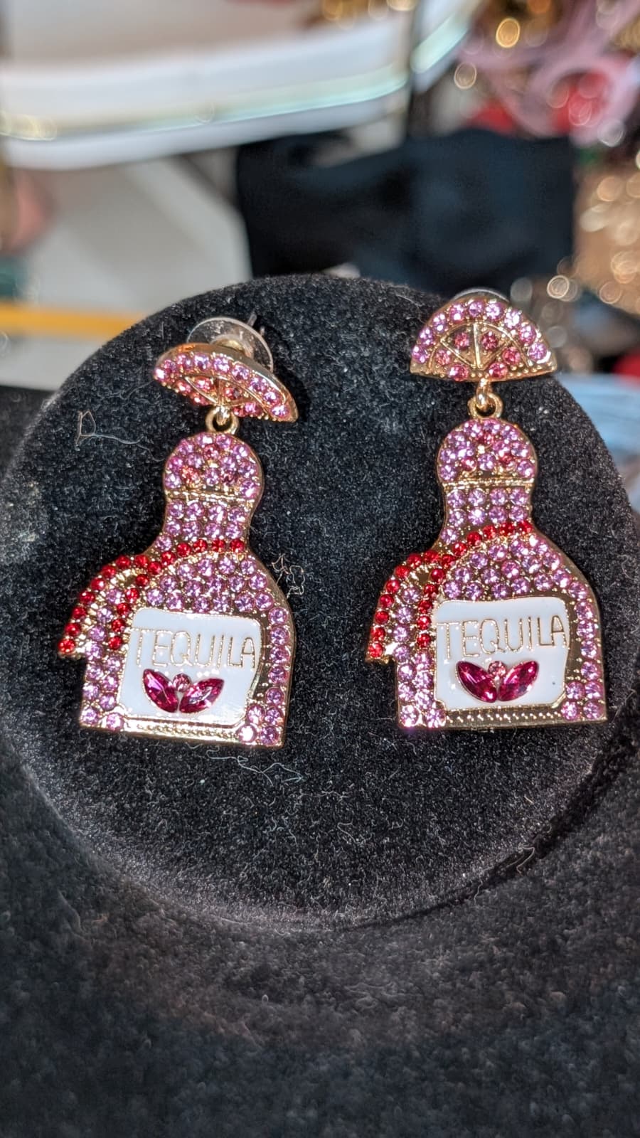 Aretes botella rosa