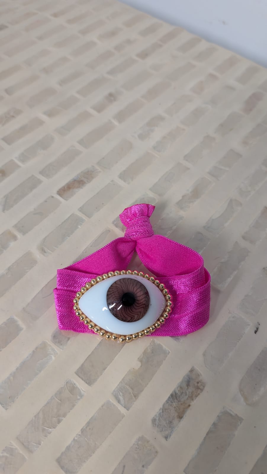 Pulsera ojo rosa